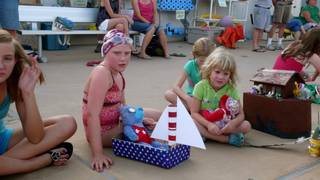 Kids at the Boulder City Pool and Racquetball Complex await the judges' results for their boats at the ninth annual Cardboard Boat Races on Wednesday.