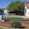 A Las Vegas home is shown for sale on July 27. Southern Nevada has seen a recent influx of investors seeking existing homes.