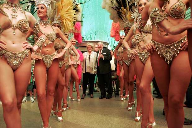 Las Vegas Mayor Oscar Goodman and his wife Carolyn prepare to make their grand entrance with "Jubilee!" showgirls.