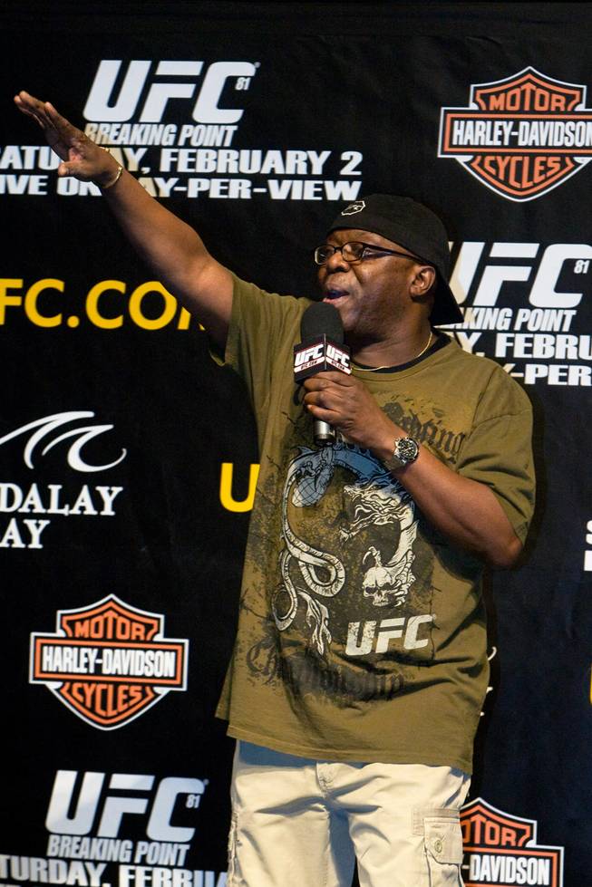 UFC site coordinator Burt Watson takes the microphone during events for UFC 81 in February of 2008. Watson, the liaison for UFC fighters, makes sure "his guys" have everything they could possibly need during fight week.
