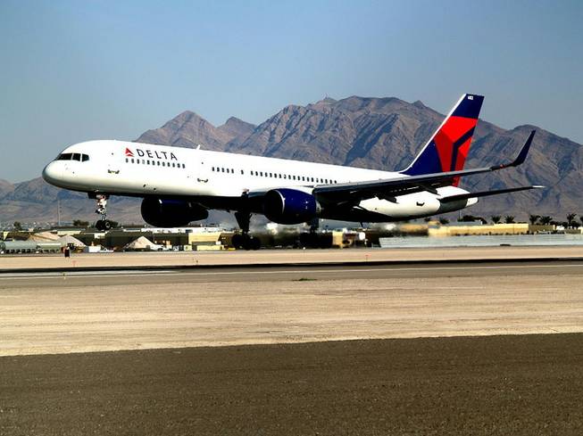 The Delta Air Lines Boeing 757 passenger plane in this photo from 2007 at McCarran International Airport is similar to the one that made an emergency landing Sunday afternoon at McCarran when smoke was smelled in the cockpit shortly after takeoff.
