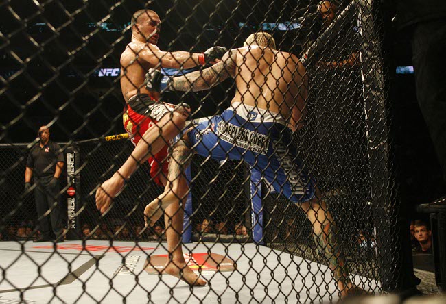 Fans of mixed martial arts and the UFC gather at the Wachovia Center on Saturday evening August 8, 2009 for a night of fighting. Battle between lightweights on the main card, Kurt Pellegrino (right) defeated Josh Neer.