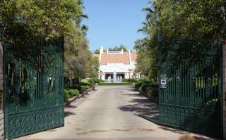 The gates that lead to the estate owned by the Primm family open to reveal a luxurious 10-acre compound. Pop singer Michael Jackson had plans to make an offer on the $16.5 million estate on Tomiyasu Lane.