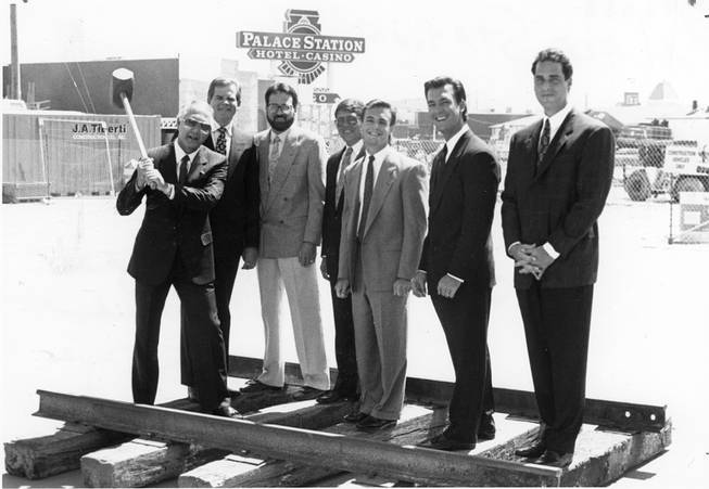 On July 9, 1990, executives from Palace Station drove a spike into a railroad tie, symbolizing the beginning of construction on their new 587-room, 22-story tower. From left are Frank Fertitta Jr. (chairman of the board), Glen Christensen (vice president/CFO), Joe Canfora (vice president/general manager), Jim Faso (senior vice president), Lorenzo Fertitta (vice president), Frank Fertitta III (president/COO) and Blake Sartini (director of casino operations). 