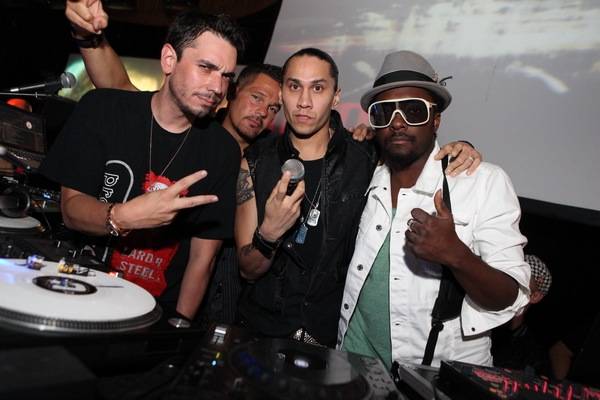 DJ AM poses with DJ R.O.B., Black Eyed Peas' Taboo, center, and Will.i.am, right, early Saturday morning, Aug. 22, 2009, at Rain nightclub in the Palms in Las Vegas.