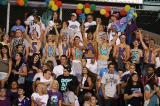 Student fans cheer from the stands after the Skyhawks scored their fourth touchdown against the Cowboys Thursday at Silverado High School. Silverado beat Chaparral 42-6.