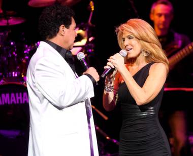 Clint Holmes and his wife Kelly Clinton Holmes perform during the Las Vegas Celebrates the Music of Michael Jackson concert in The Pearl at the Palms on Aug. 28, 2009.