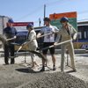 From left, Clark County Commissioner Larry Brown, U.S. Rep. Shelley Berkley, RTC General Manager Jacob Snow and RTC Deputy General Manager Tina Quigley join together to break ground Monday on the $17-million Bonneville Transit Center located at Casino Center Boulevard and Bonneville Avenue.