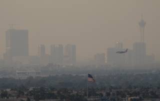 Smoke from California wildfires obscures the Las Vegas skyline in this photo taken from Henderson Monday, Aug. 31, 2009. 