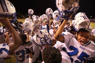 Basic celebrates after a win against the Desert Pines Jaguars Friday at Desert Pines High School in Las Vegas. Basic dominated the game with a 25-6 win.