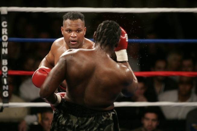 Willie Chapman, left, during a fight with Carlos Barnett at the Orleans hotel-casino Jan. 11, 2008. 