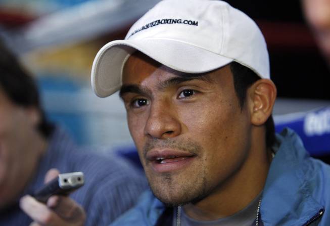 Juan Manuel Marquez fields questions from media members inside the MGM Grand Garden Arena Tuesday. 