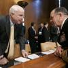 Sen. John McCain, R-Ariz., left, talks with Joint Chiefs Chairman Adm. Michael Mullen on Capitol Hill in Washington today. McCain tried unsuccessfully to strip $1.7 billion in earmarks from next year's transportation spending bill, which would have hurt funds for Nevada projects. 