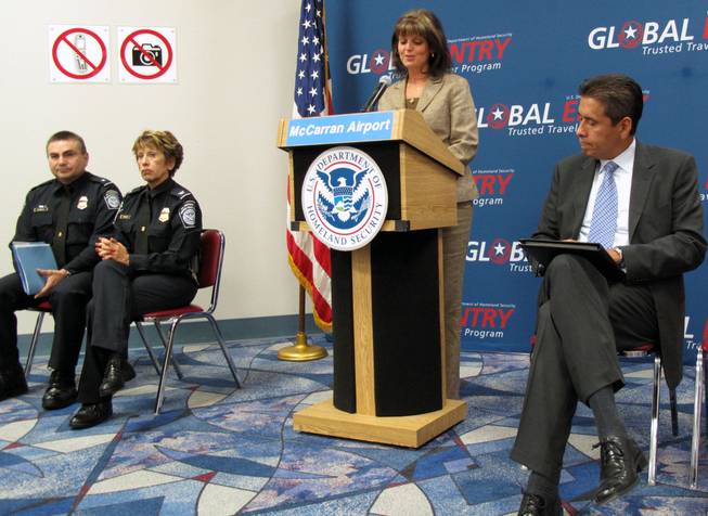 Clark County Deputy Director of Aviation Rosemary Vassiliadis speaks at a press conference to show off the new Global Entry kiosks at McCarran International Airport's Terminal 2 on Wednesday. Looking on are, from left, Sergio Espinoza, Los Angeles assistant port director, Debbie Sanders, McCarran area port director, and Carlos Martel, Los Angeles area port director.