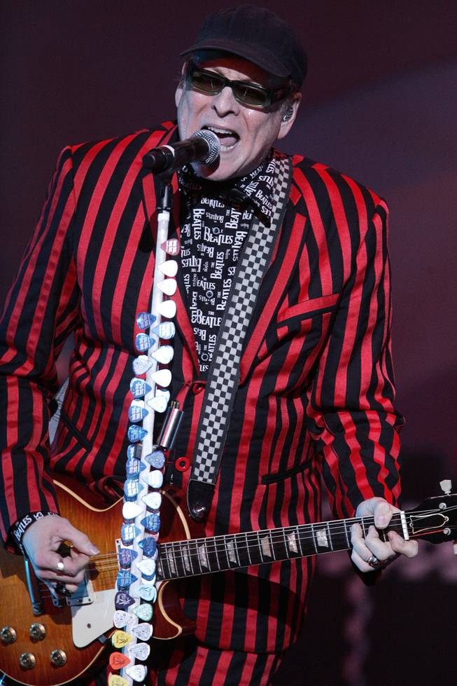 Rick Nielsen plays guitar during "Sgt. Pepper Live" featuring Cheap Trick Tuesday, Sept. 15, 2009 at the Las Vegas Hilton.