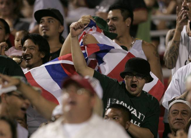 Hawaii fans cheer after a field goal against UNLV during the the Rebels' 34-33 victory at Sam Boyd Stadium on Sept. 19, 2009.