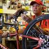 While working part-time at B.C. Adventure Bicycles, cyclist Don Sanders, 62, discusses the reasons he and his wife settled down in Boulder City after moving from Phoenix four years ago. 
