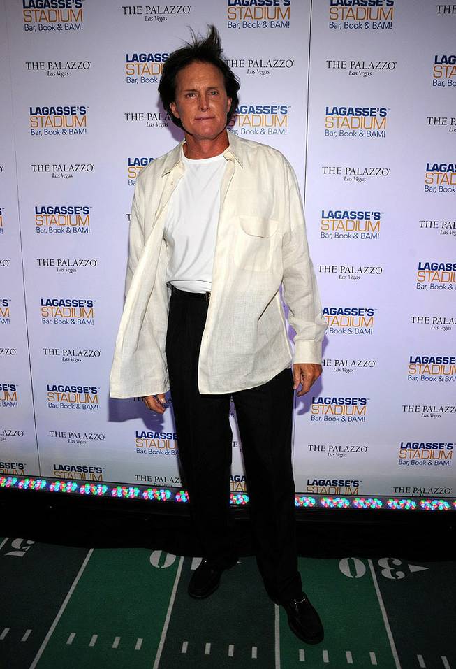 Bruce Jenner, stepfather of Khloe Kardashian, walks the red carpet Friday, Sept.25, at the opening of Emeril Lagasse's Stadium eatery at the Palazzo hotel and casino in Las Vegas.