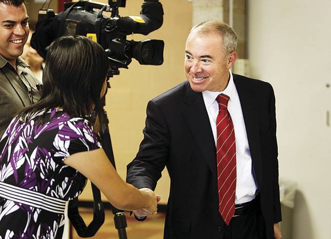 Alejandro Mayorkas, director of U.S. Citizenship and Immigration Services, greets reporters before a news conference last week at the Winchester Cultural Center. 