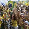 People celebrate after Rio de Janeiro won the nomination to host the 2016 Olympic Games at the Copacabana beach, in Rio de Janeiro on Friday. Nearly 50,000 people erupted in celebration when Rio was announced host, jumping and cheering in a Carnival-like party.