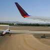 No tail wind: A Southwest Airlines jet takes off at McCarran International Airport as an American Airlines jet waits to taxi to its gate. Aviation analyst Mike Boyd expects McCarran traffic to begin to improve next year but says it won't reach 2008 levels for at least five years.