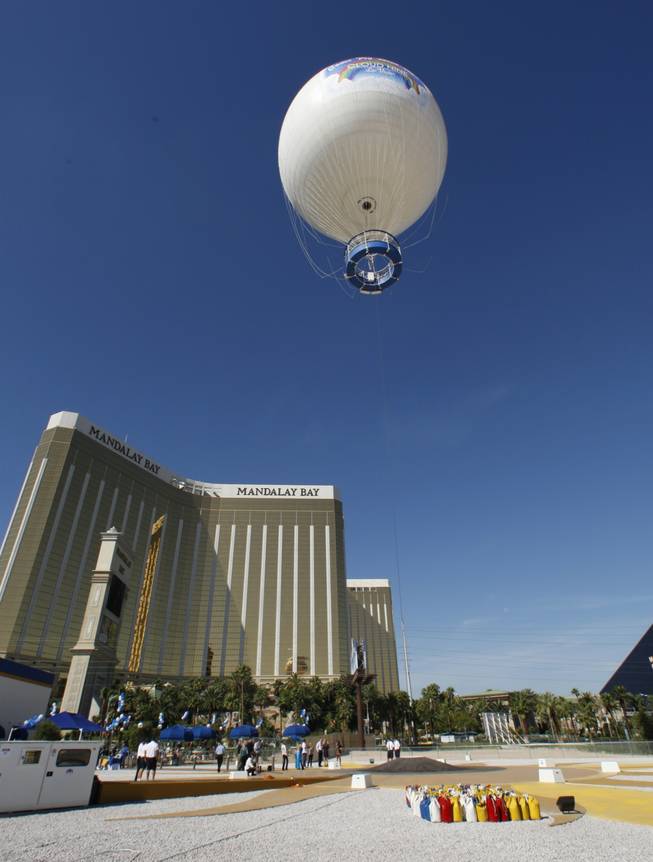 Cloud Nine, the world's largest helium-filled, land-tethered balloon, lifts off for an inaugural flight during the official opening Thursday, Oct. 8, 2009.