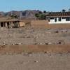 Empty lots are a common site in Tuscany, where home sales and construction have been slowed by Nevada's dismal economy. Residents of the Henderson development say the problems have been exacerbated by Jim Rhodes, who they accuse of mismanaging their homeowners association.