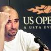 
Andre Agassi speaks after a loss at the 1997 U.S. Open in New York. His autobiography contains an admission that he used crystal meth that year.