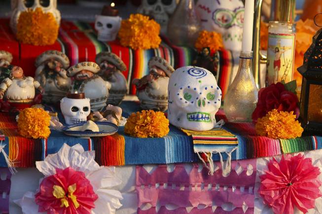 Colorful paper decorations and sugar-coated skulls are on display in many of the altars presented at the annual Life in Death: Day of the Dead Festival at the Winchester Cultural Center and Park, Nov. 1, 2009.
