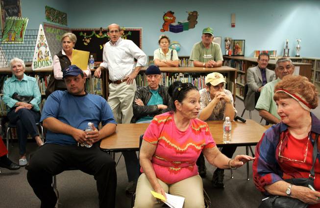 Neighbors of the school gather at Elaine Wynn Elementary School during a community meeting about a proposed health clinic on the school's campus in Las Vegas Monday, Nov. 2, 2009. 