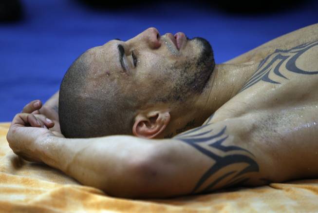 WBO welterweight champion Miguel Cotto of Puerto Ricorelaxes after a workout at the Pound4Pound Gym in Los Angeles on Tuesday, Nov. 3, 2009. Cotto is scheduled to defend his title against Manny Pacquiao of the Philippines at the MGM Grand Garden Arena on Nov. 14. 