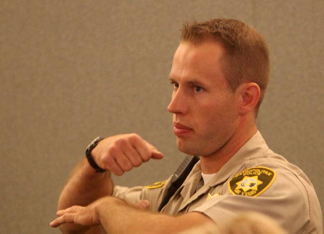 Officer Derek Colling testified Nov. 6, 2009, in front of a Clark County coroner's jury in the case involving the death of Tanner Chamberlain.  Colling shot Chamberlain while  he held a knife to his mother's throat.