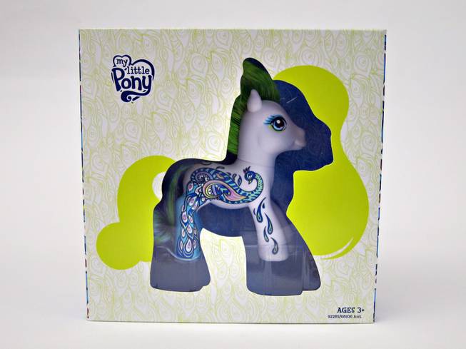 My Little Pony figure with big, beautiful eyes, a happy face and rainbow colored hair. Ages 3+ (Retail $5.99)
