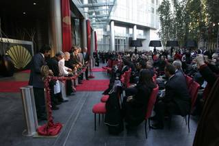 A ribbon of flowers is cut at the grand opening of the Mandarin Oriental at CityCenter, Friday, Dec. 4, 2009.