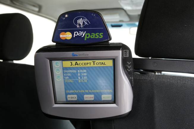 Convenience factor: A PayPass payment system is shown in the back of a taxi at Deluxe Taxicab Services in Henderson. VeriFone Transportation Systems provided Deluxe with the technology for free.