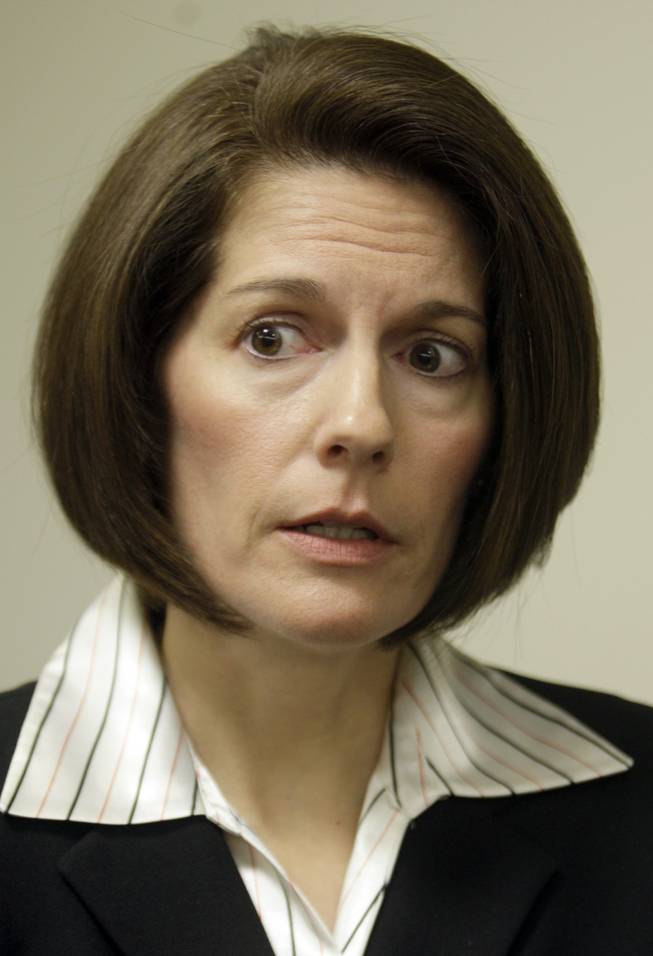 Attorney General Catherine Cortez Masto responds to a reporter's question following a news conference at the Sawyer State Building Thursday, Dec. 10, 2009.  