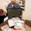 Gaming Control Board investigator James Taylor shows some of the evidence seized over the years in probes of casino cheaters. The board's agents make as many as 500 such arrests annually.