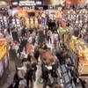 
Exhibitors and attendees of the American Gaming Association's Global Gaming Expo check out the newest slot machine offerings last month at the Las Vegas Convention Center. Despite the economic climate, the menu of new machines is as full as it was when gaming was booming.