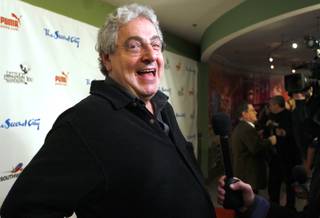  In this Dec. 12, 2009 file photo, actor and director Harold Ramis laughs as he walks the Red Carpet  to celebrate The Second City's 50th anniversary  in Chicago.  An attorney for Ramis said the actor died Monday morning, Feb. 24, 2014, from complications of autoimmune inflammatory disease. He was 69. Ramis is best known for his roles in the comedies 
