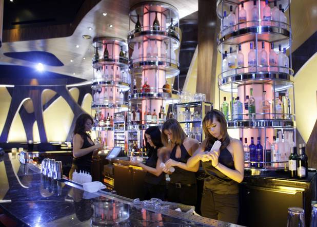 Employees ready the bar at the Union Restaurant and Lounge inside Aria, the centerpiece of the $8.5 billion CityCenter project, in Las Vegas Monday, December 14, 2009. 