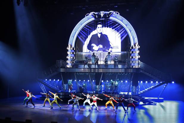 Cast members dance during a media preview of the new ...