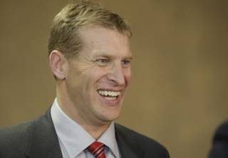 New UNLV head football coach Bobby Hauck smiles during a news conference at UNLV Wednesday, December 23, 2009. Hauck had a 80-17 record at Montana where he was the head coach from 2003.