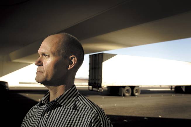 Tom Skancke, who envisions high-speed rail being built in Las Vegas, stands at the Interstate 215 underpass at Decatur Boulevard.