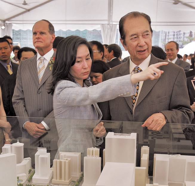 
Casino billionaire Stanley Ho and daughter Pansy Ho attend a groundbreaking ceremony for an MGM Mirage casino in 2005 in Macau.