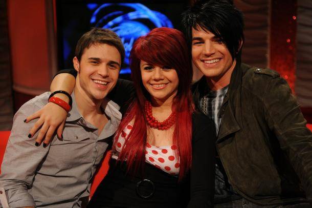Kris Allen, left, and Adam Lambert compete in the finals of Season 8 of <em>American Idol</em>. With them is Allison Iraheta, who finished fourth in the Fox singing competition behind Danny Gokey.
