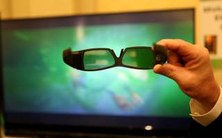 Mitsubishi unveils its new 3D televisions at the CES Unveiled event Tuesday at the Venetian.