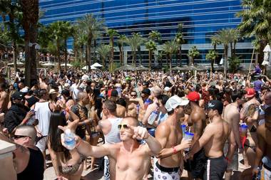 Crowds pack the Hard Rock Hotel’s Rehab pool party.