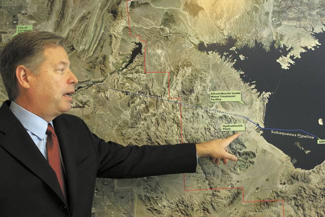 Chip Maxfield, general manager of the Clean Water Coalition, shows the path of the coalition's proposed pipeline to send treated wastewater to Lake Mead. Maxfield favors postponing the pipeline project -- not scrapping it -- so the effect of quagga mussels on the lake can be assessed.