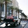 A truck carries the casket with slain court security officer Stanley Cooper in a procession past the Lloyd George Federal Courthouse Monday, Jan. 11, 2010. 