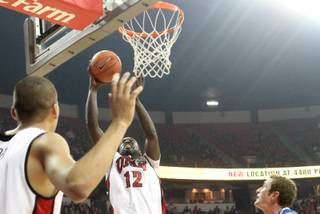 Brice Massamba lays it in for two of his six first half point as UNLV takes on Air Force at the Thomas & Mack Tuesday.